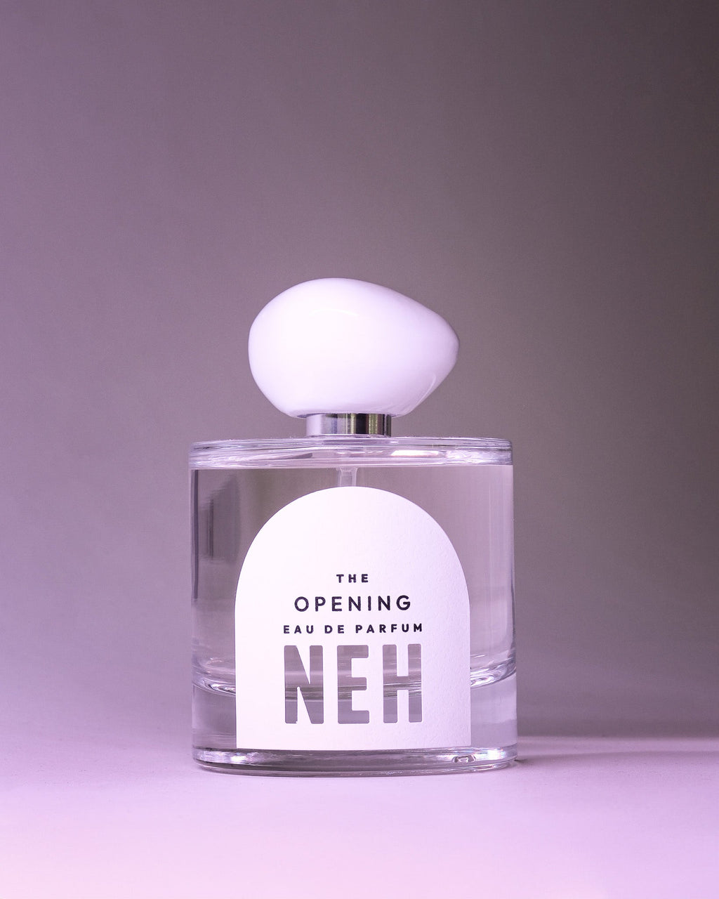 NEH The Opening eau de parfum 100 ml mot lila bakgrund