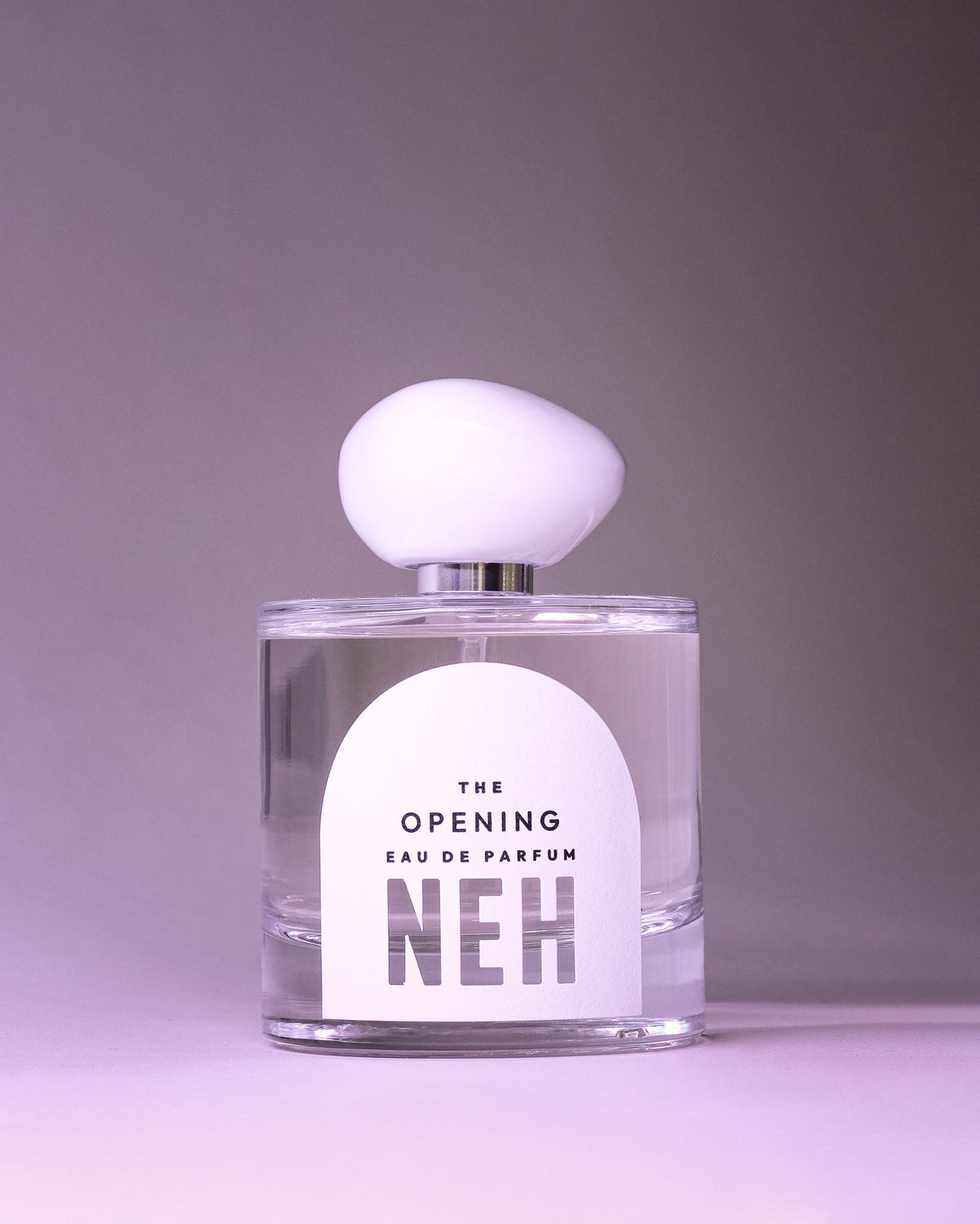 NEH The Opening eau de parfum 100 ml mot lila bakgrund